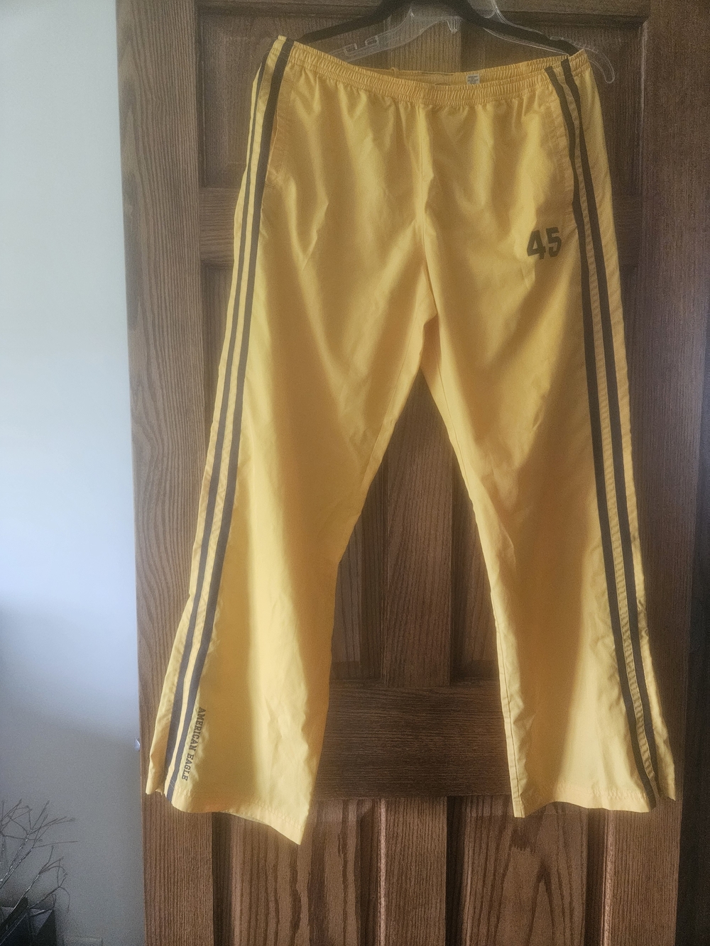 American Eagle Outfitters Men’s Yellow Track Pants with Black Side Stripes